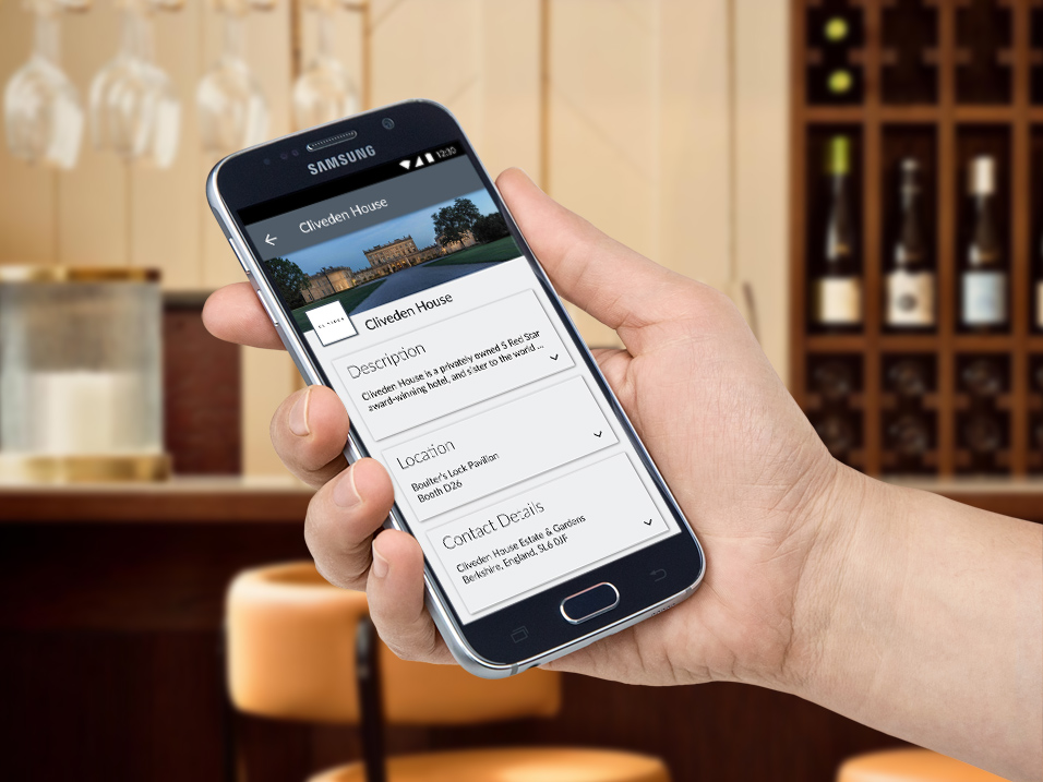Lanyon app: Man holding an Android phone with the Sponsor Details page displayed